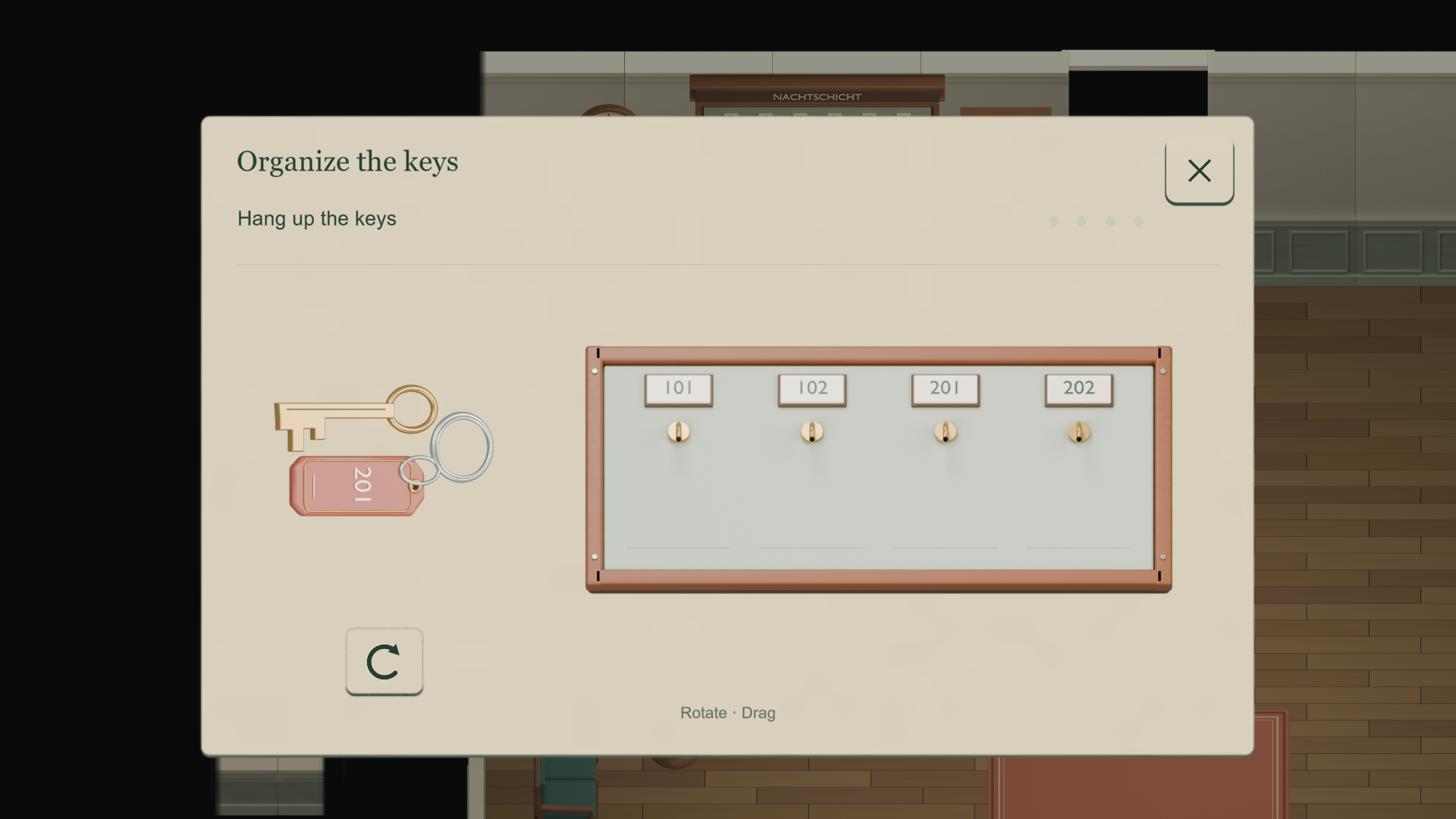 The Organize the keys task, with a brass key and numbered hooks